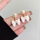 Ivory Bow Pearl Drop Earrings